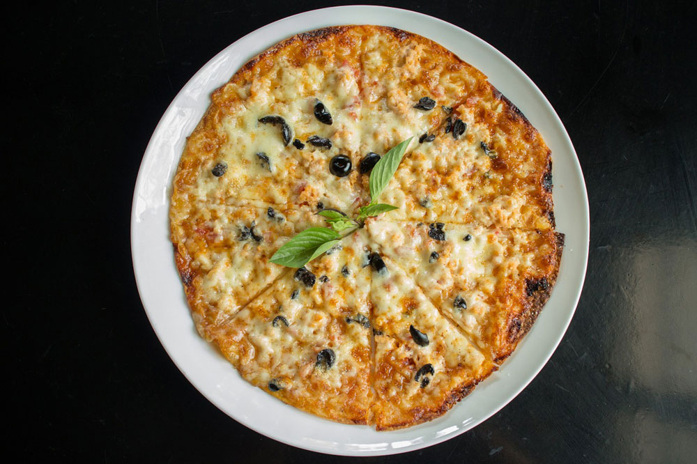 Fresh pizza with generous toppings